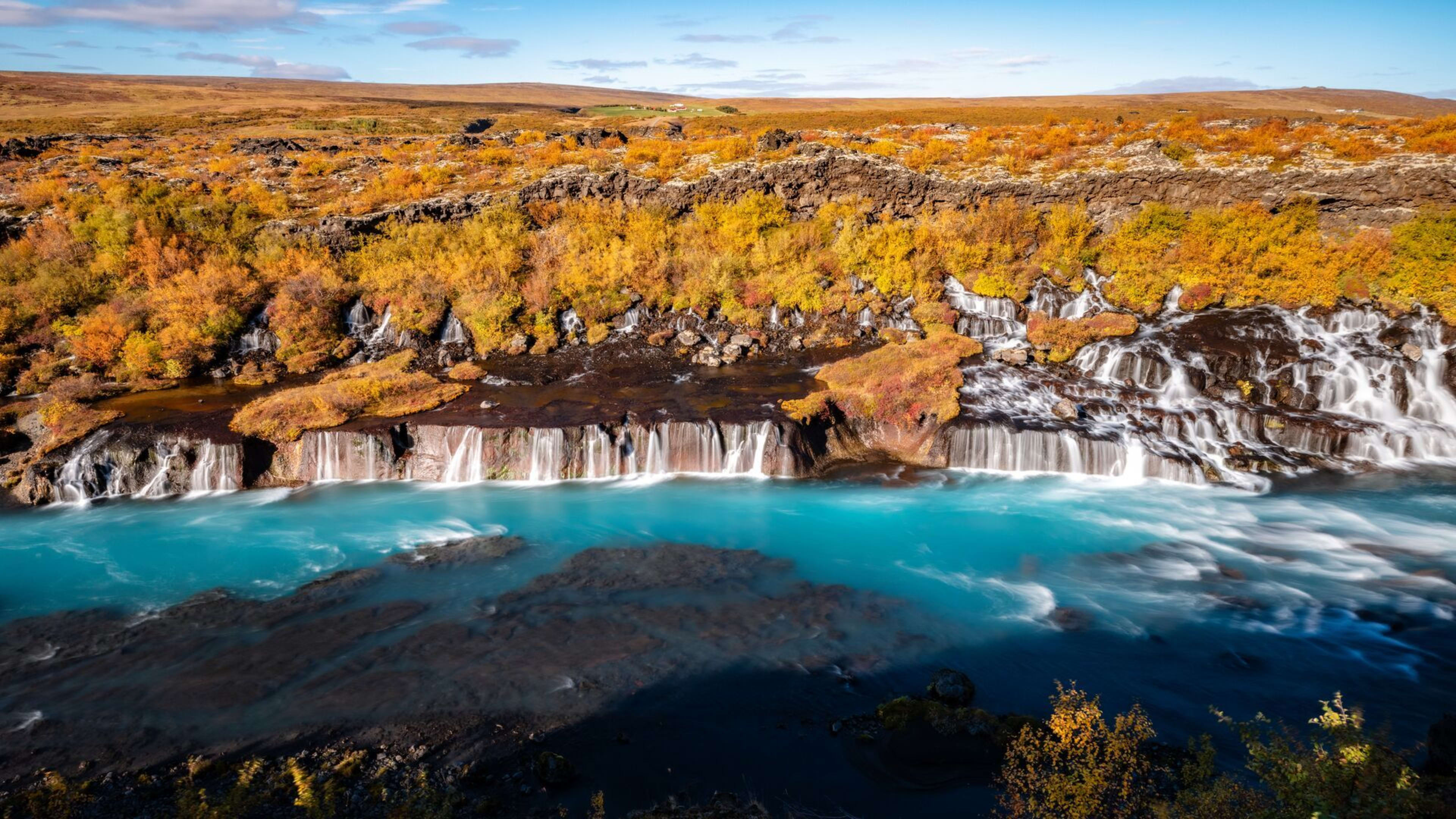 Hraunfossar with blue water in autumn