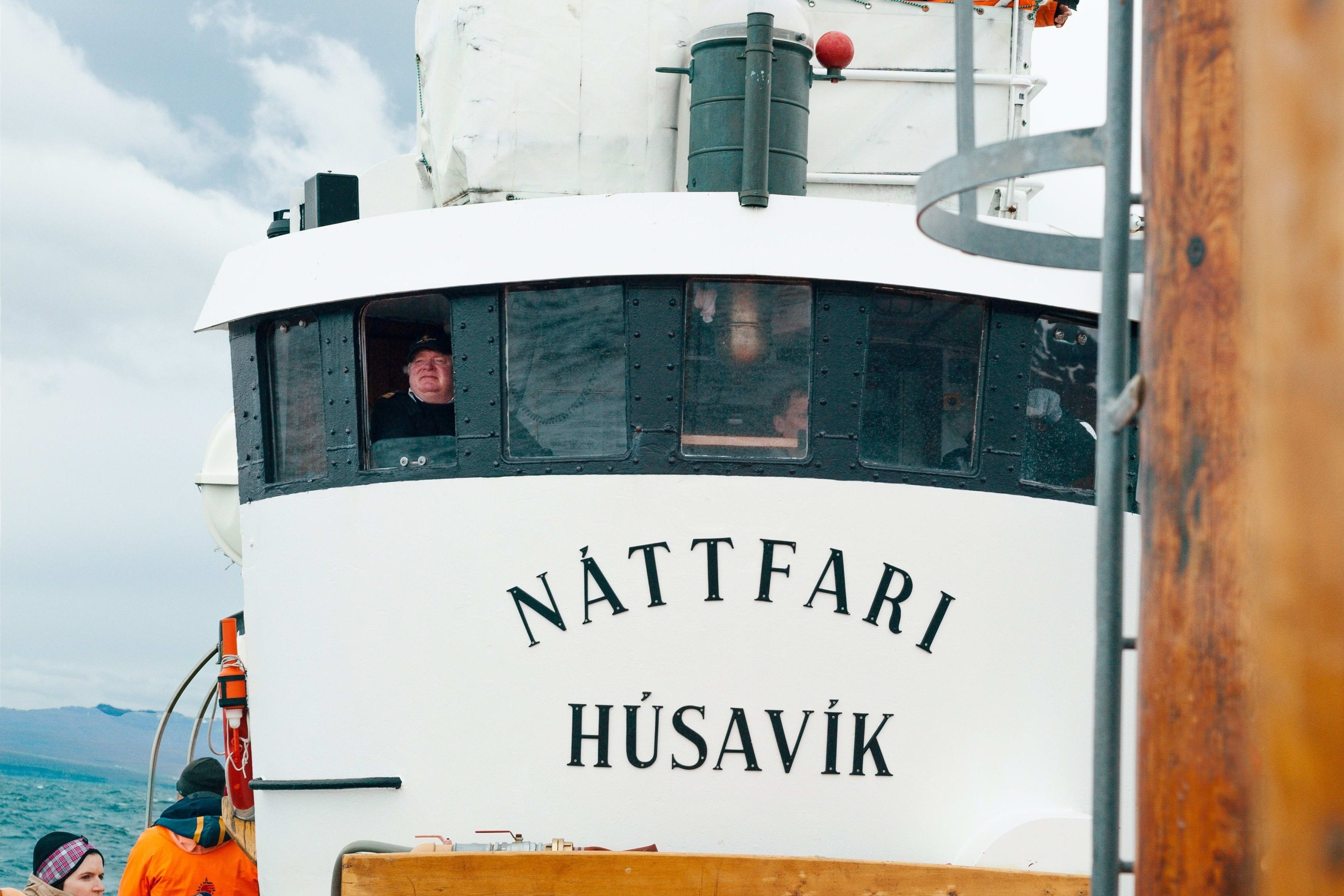 Husavik whale watching boat with people