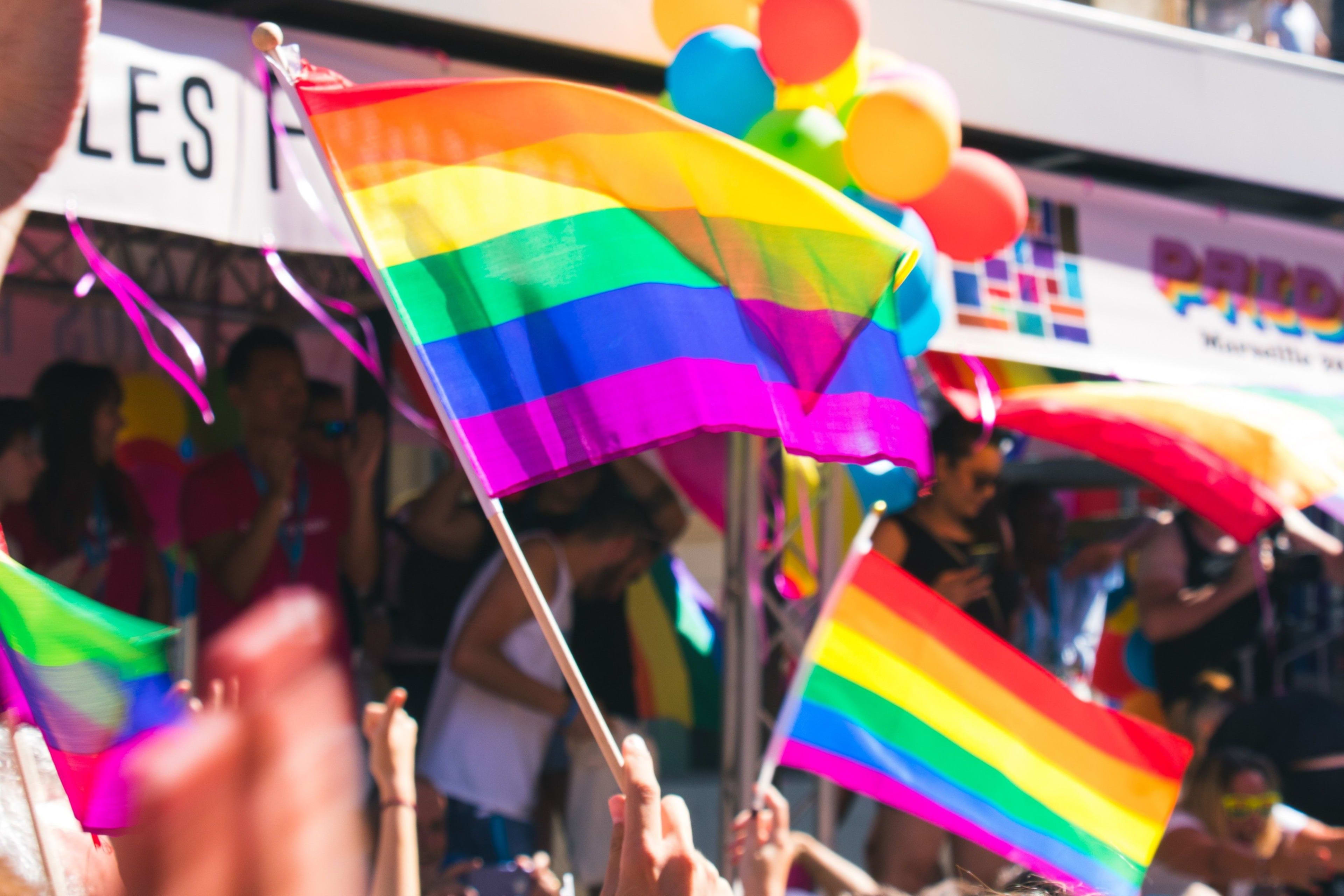 Reykjavík Pride parade with rainbow flags