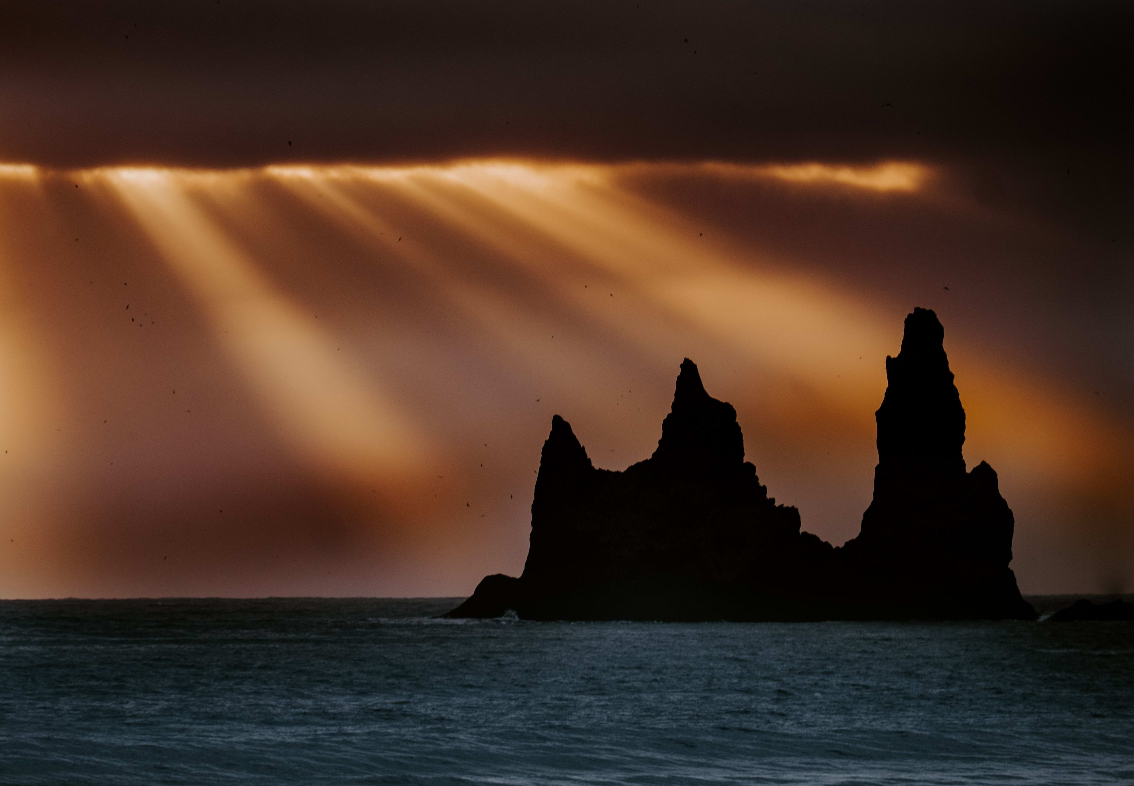 Reynisdrangar under the rays of morning sun