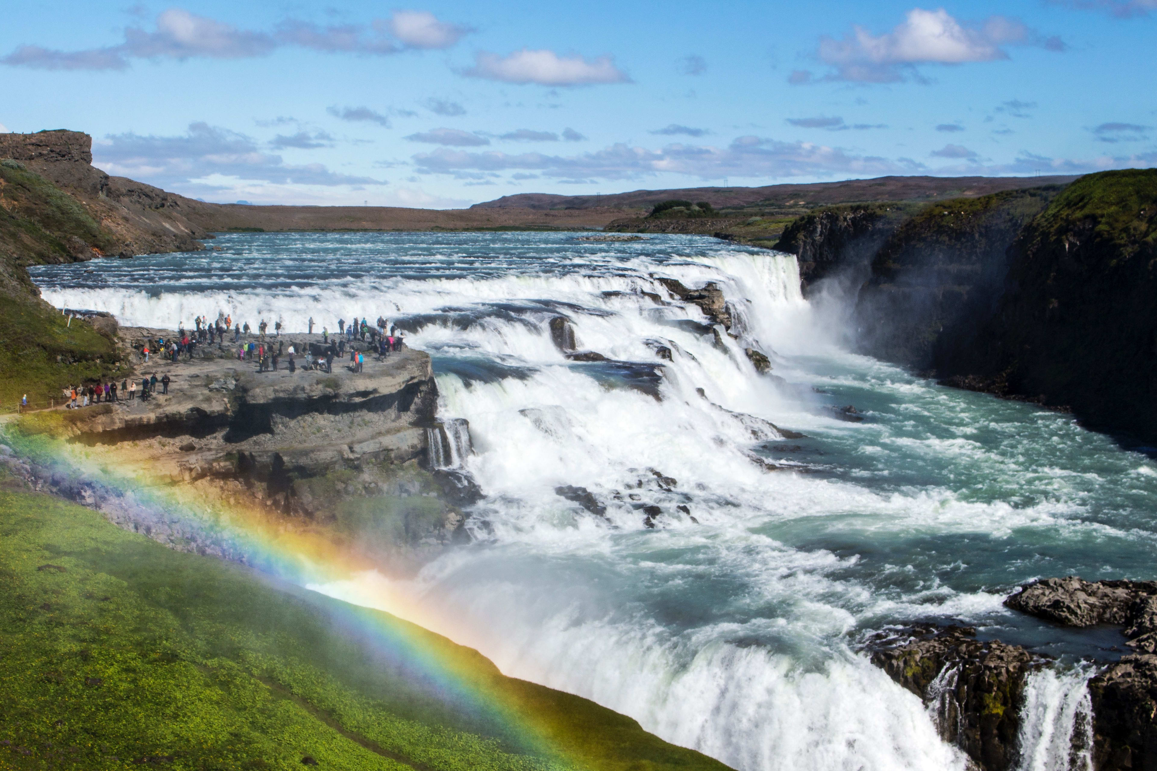 rainbow over gullfoss in golden circle