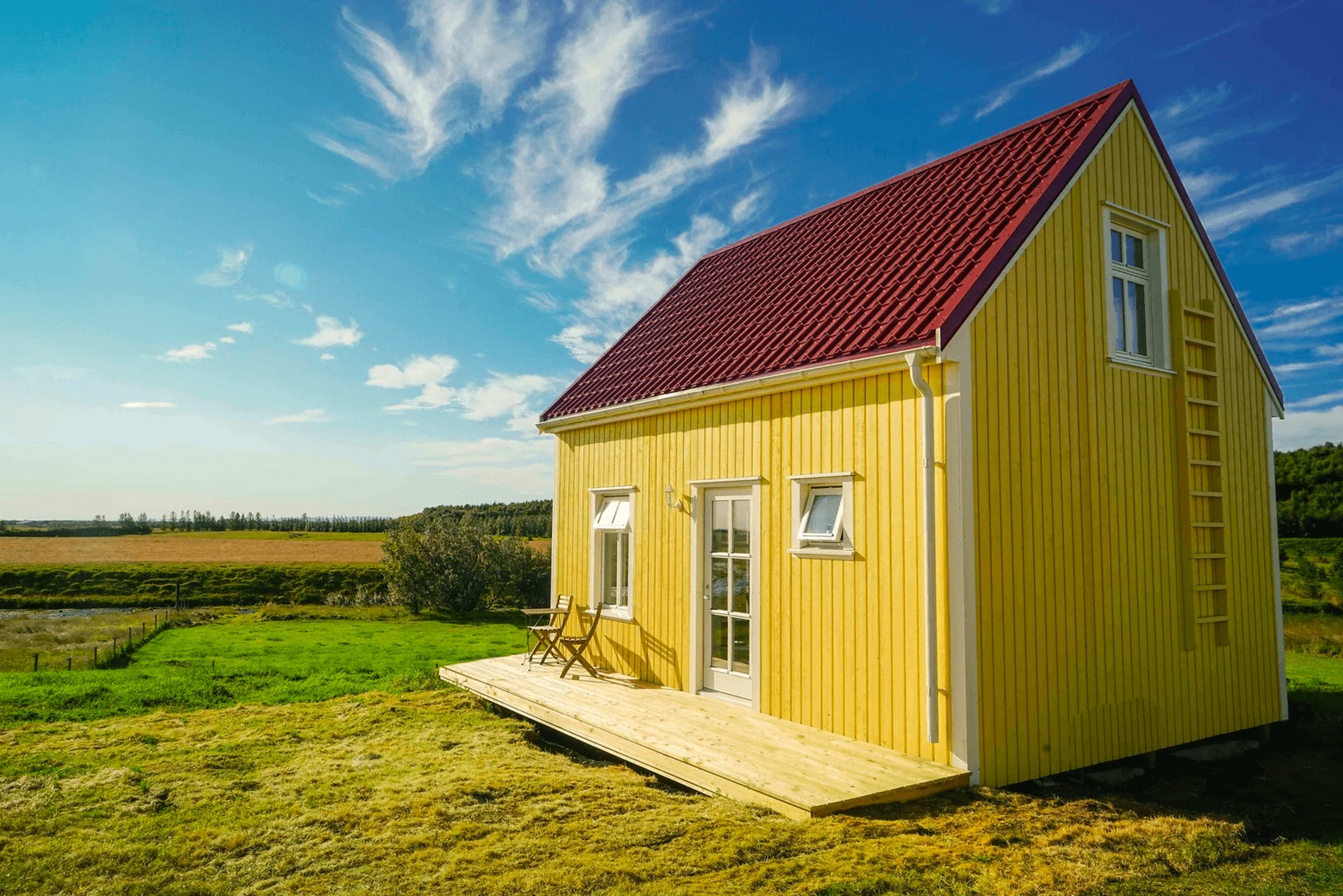 yellow colored guesthouse of iceland