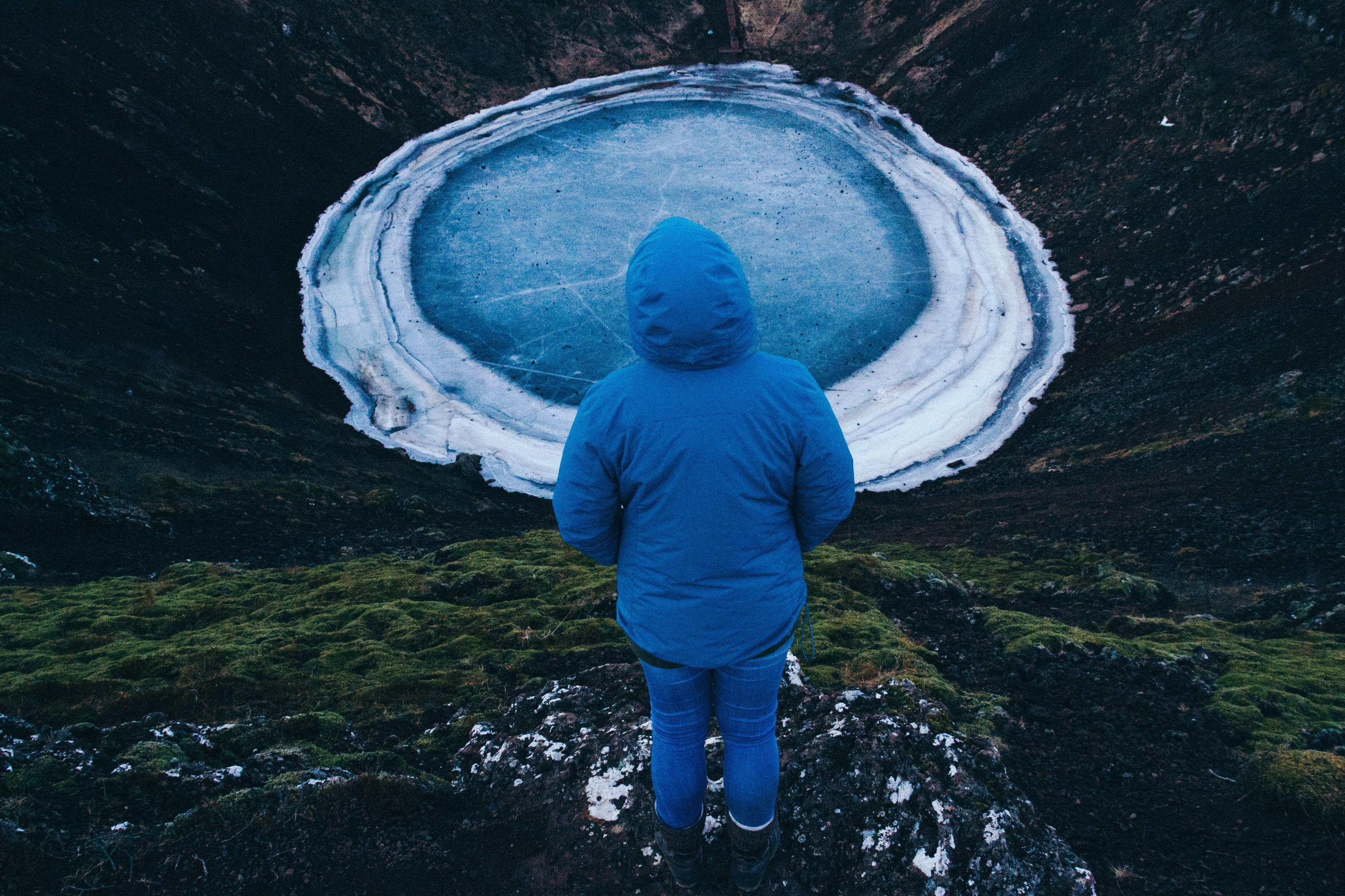 people look down at kerid crater lake