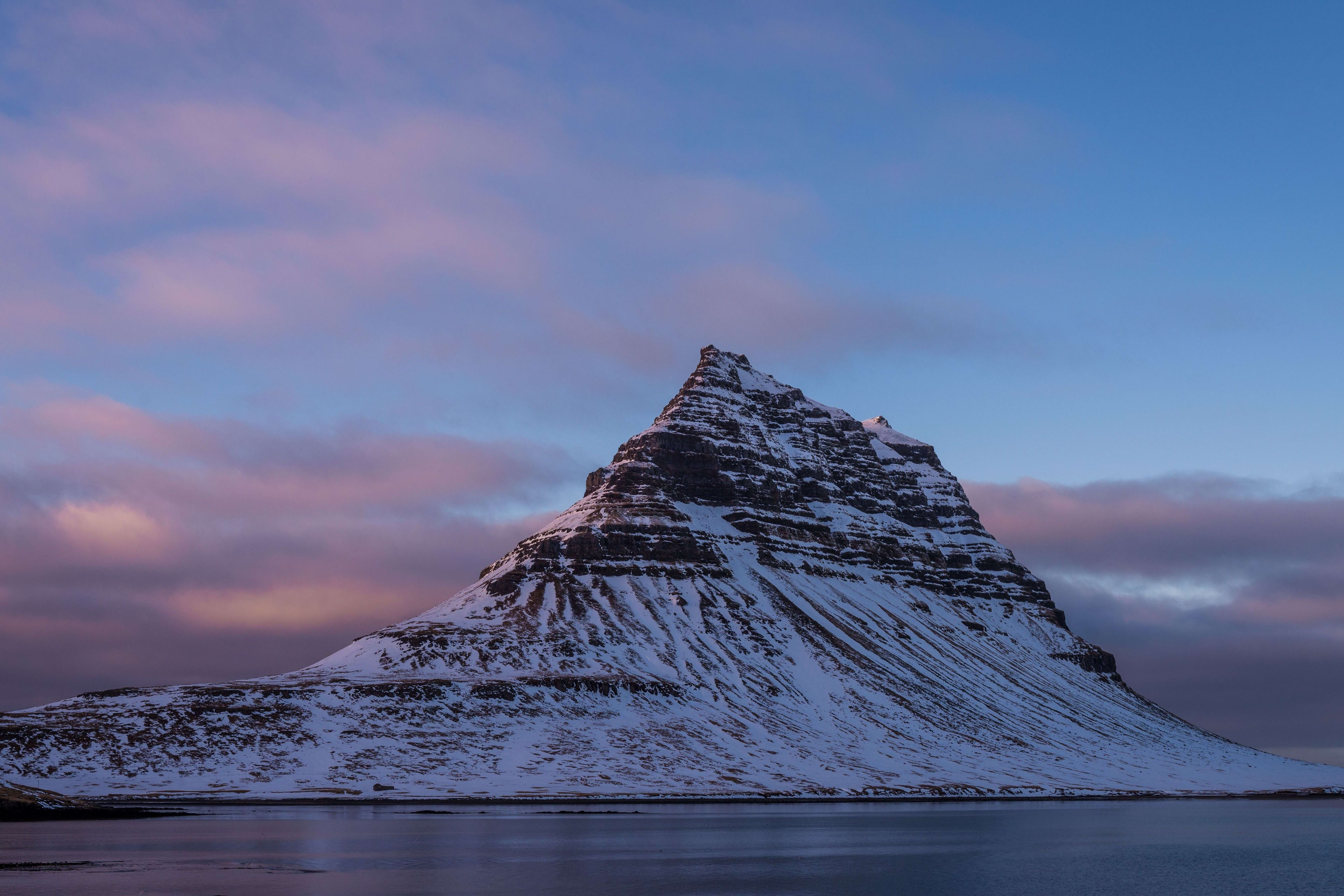 kirkjufell in winter under purple sky