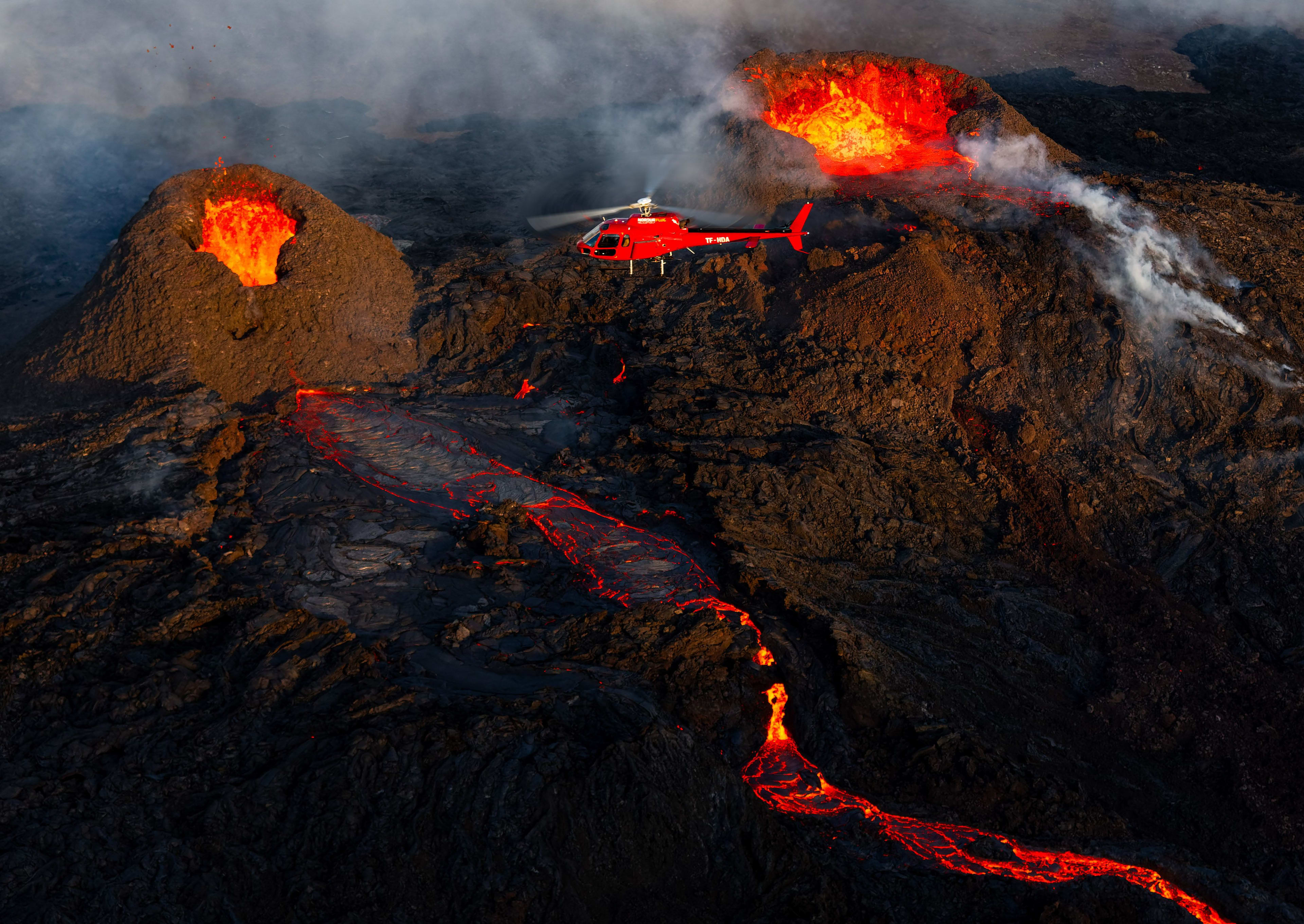 volcano eruption watching from helicopter