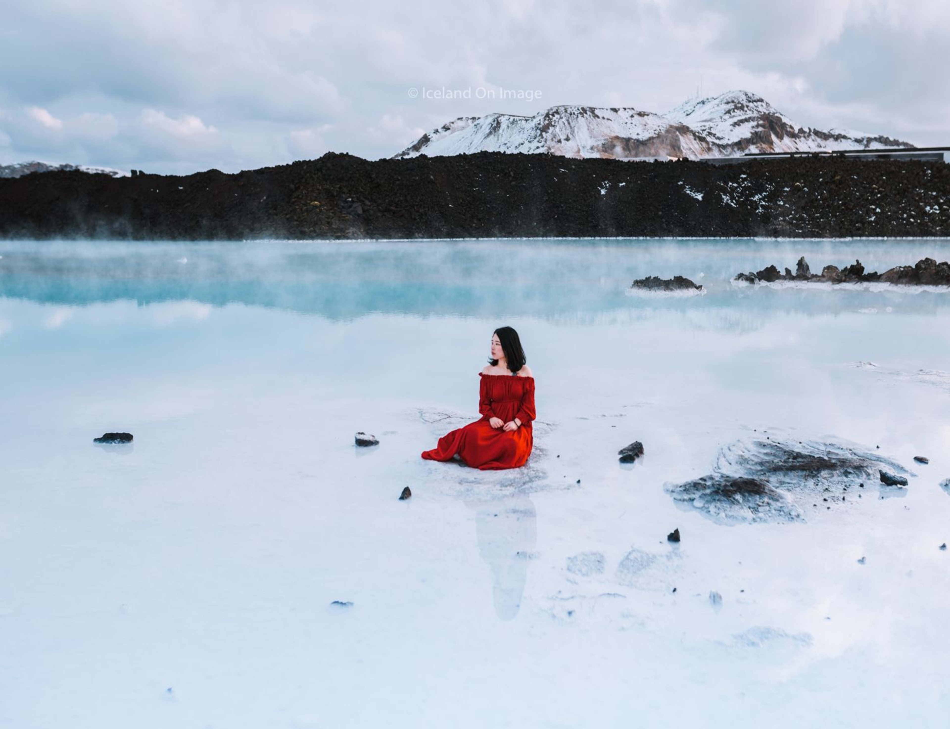 girl in red dress at dreamy reykjanes