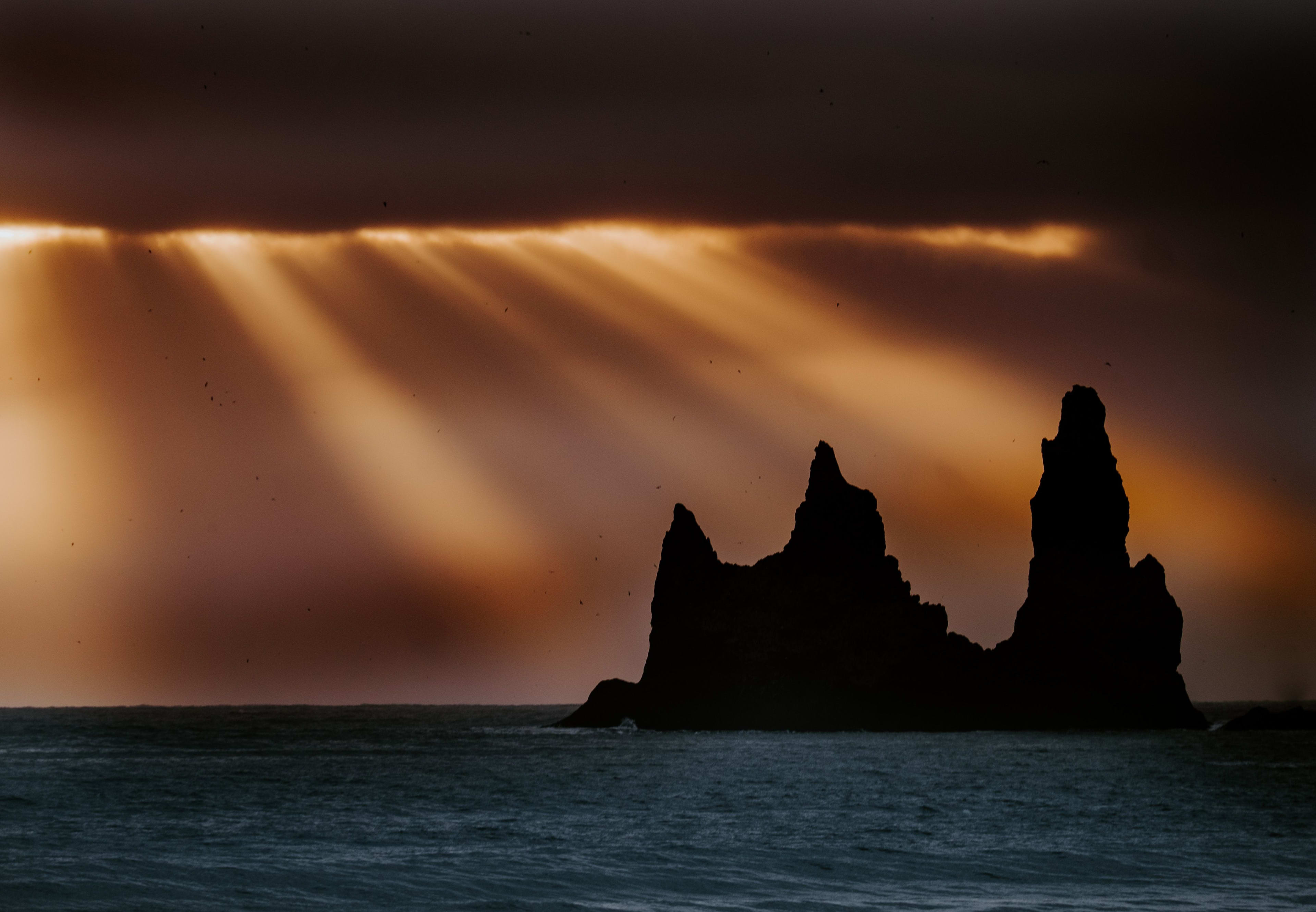 Reynisdrangar under the rays of morning sun