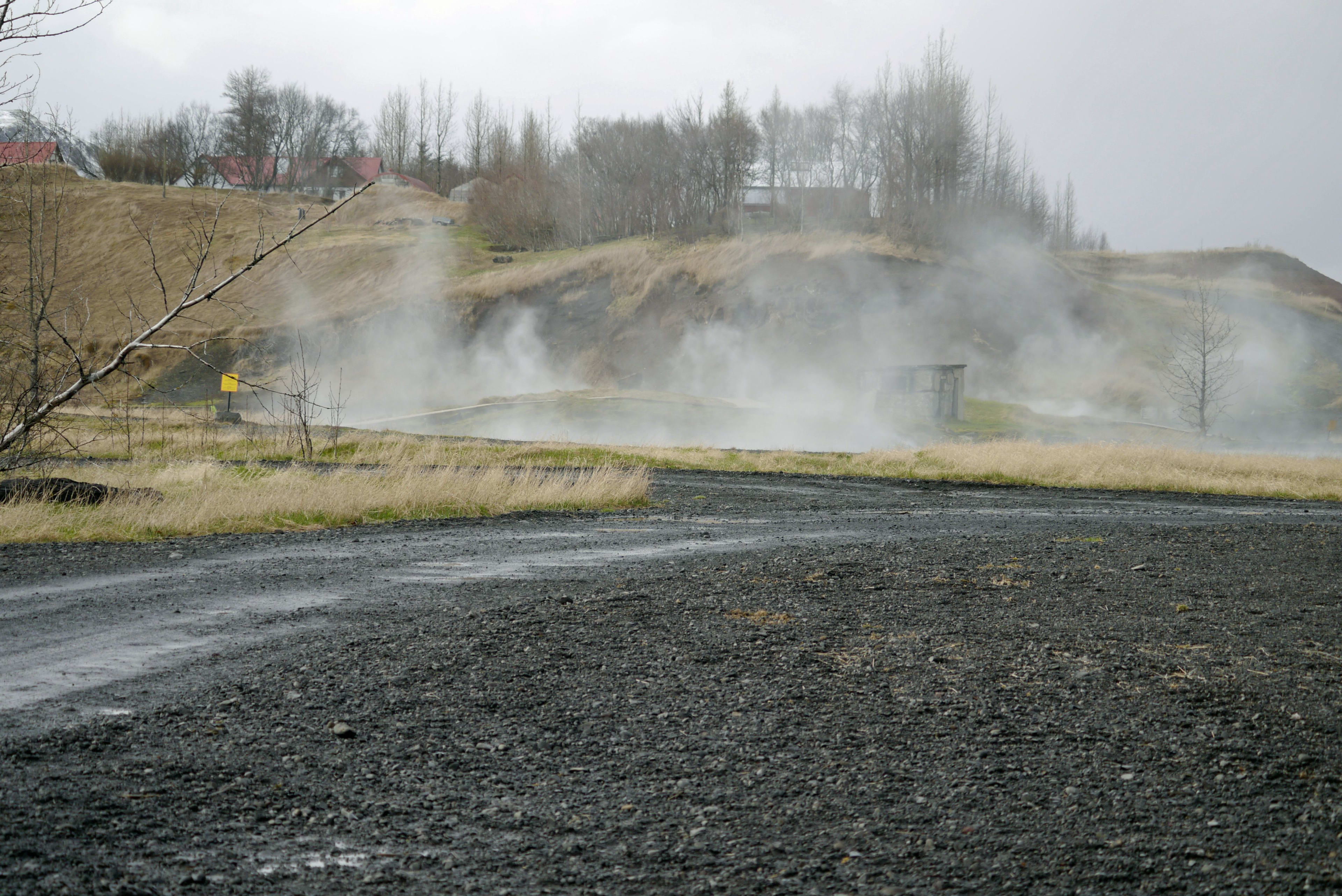 Secret Lagoon hot spring with steam