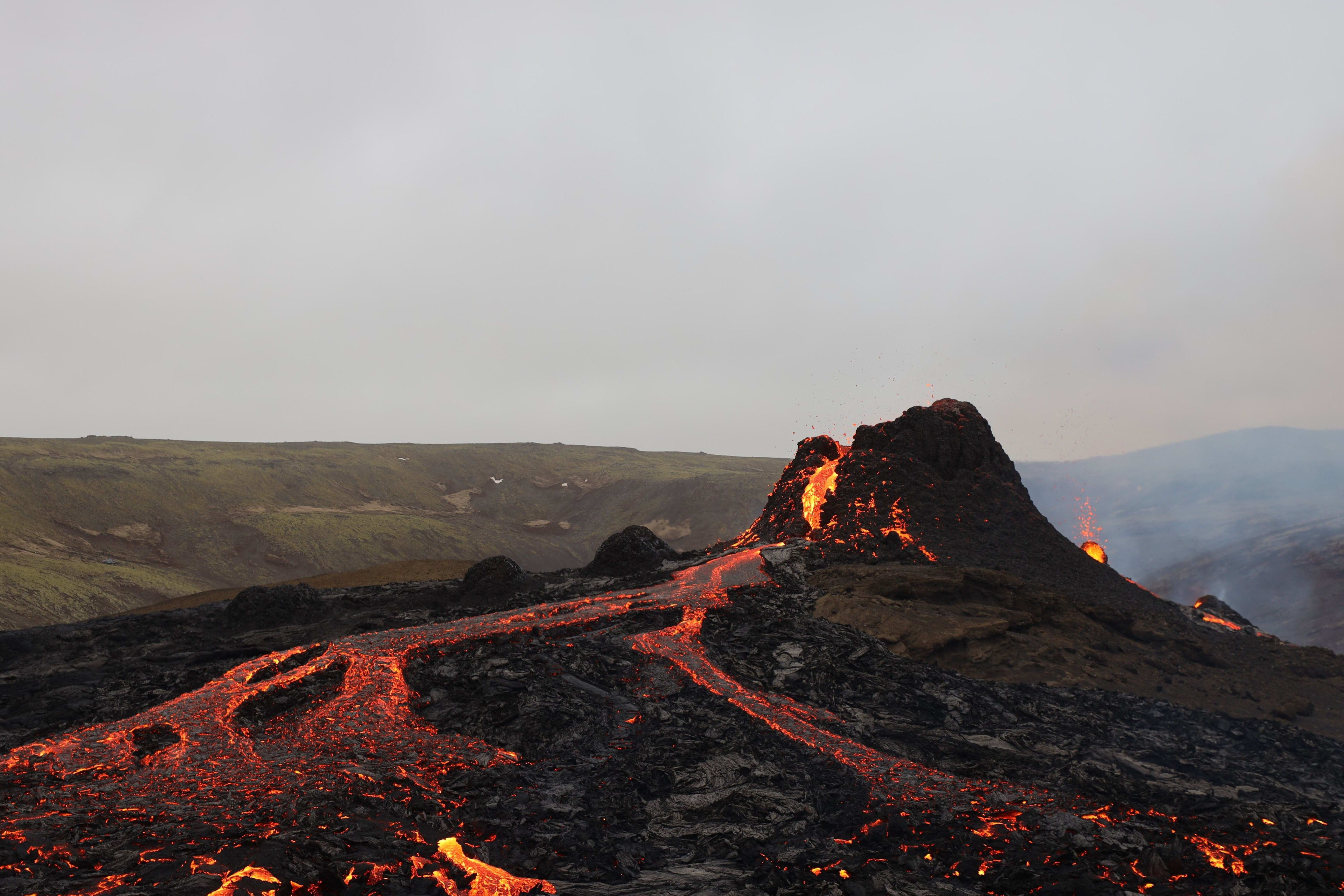 icelandic volcano eruption and lava flowing