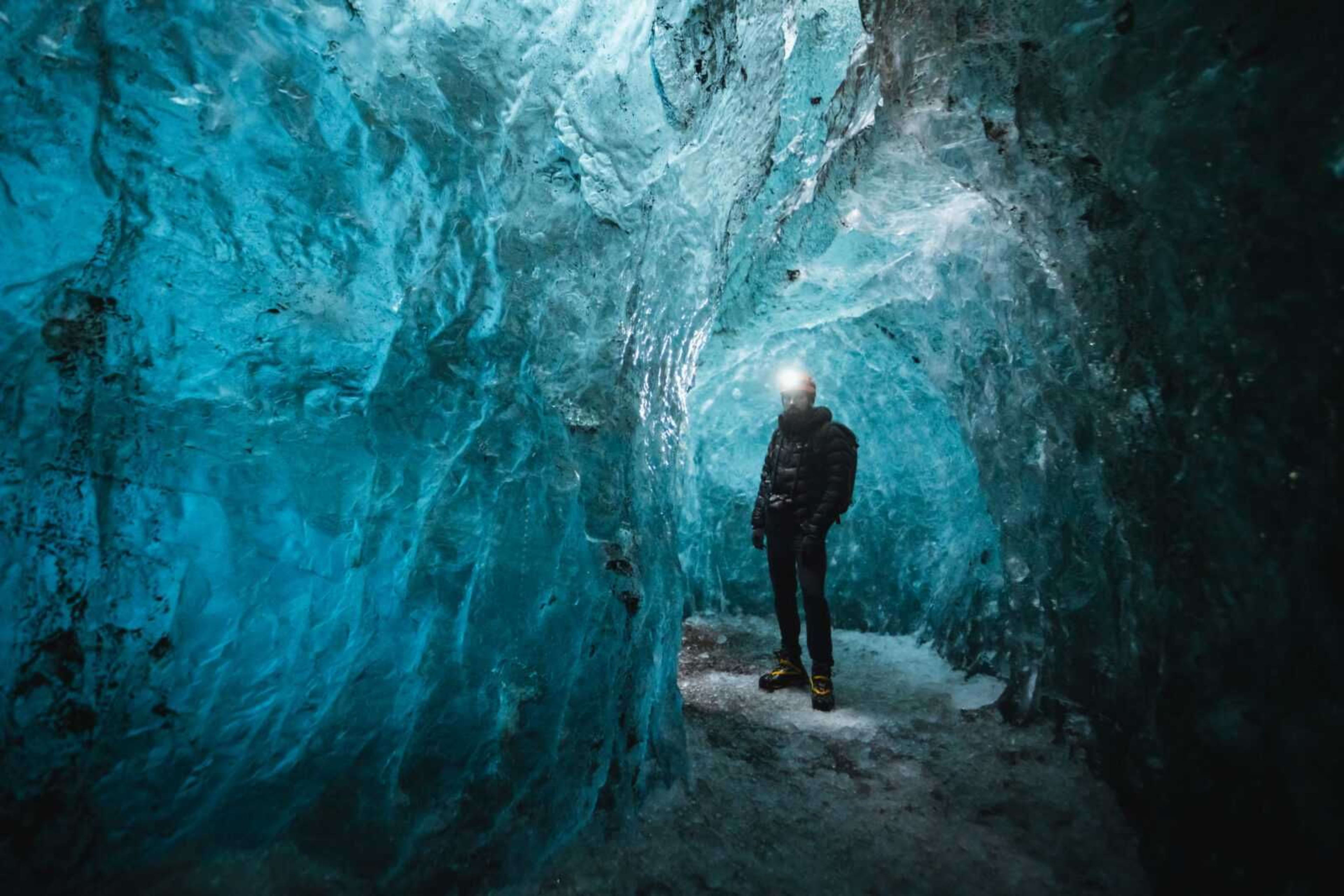 explore the blue ice cave with headlight