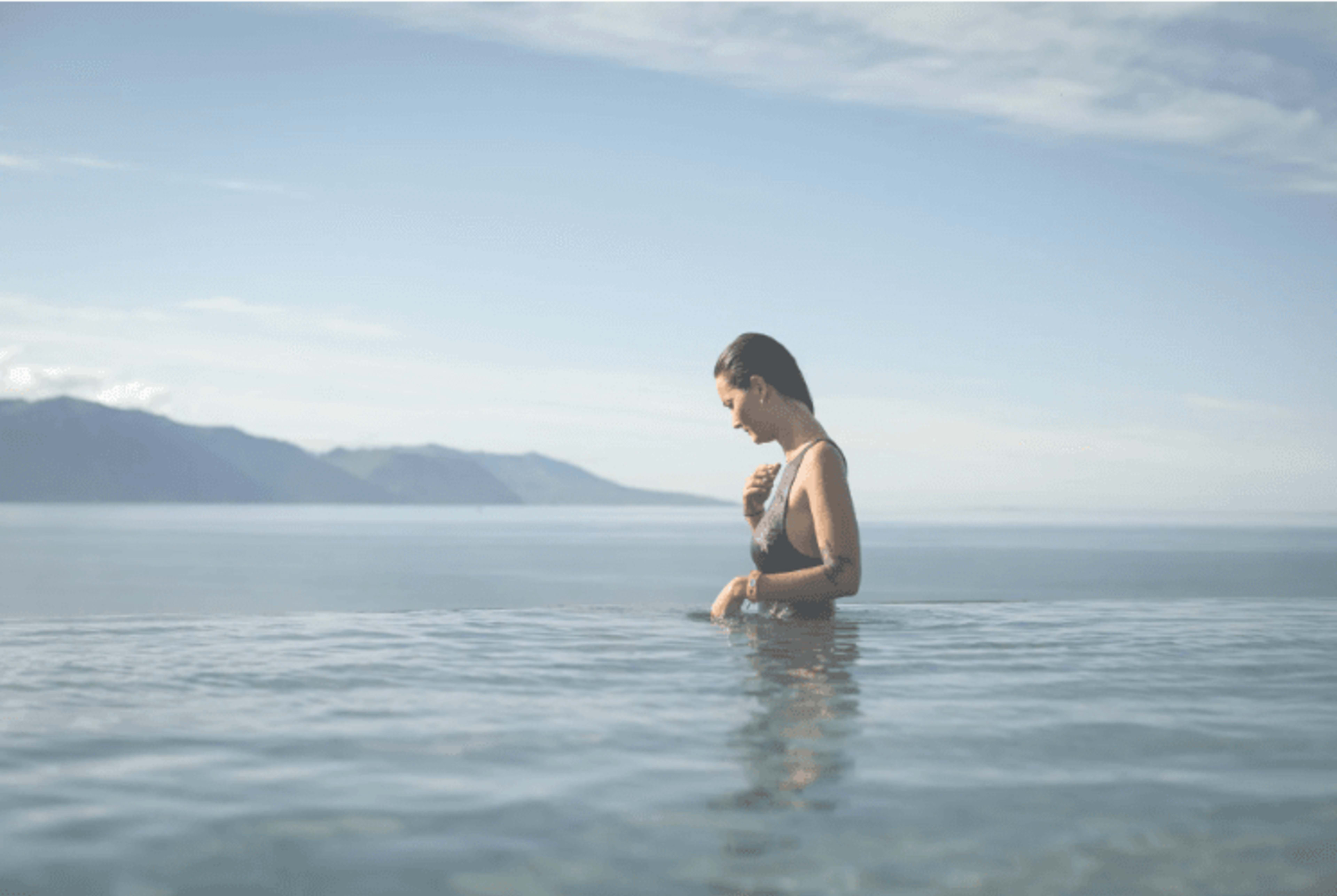 woman bathing in geosea hot spring