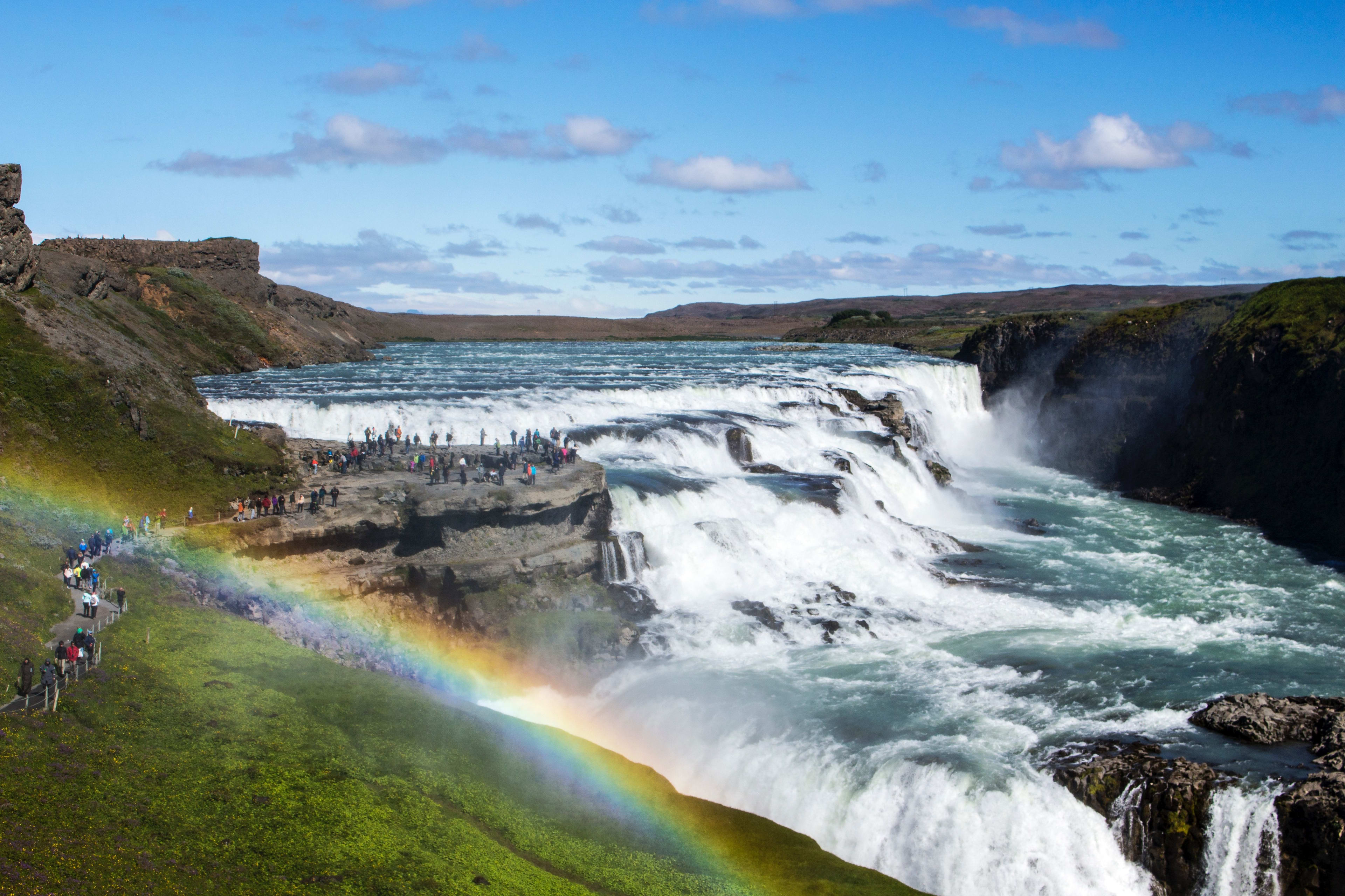 rainbow over gullfoss in golden circle