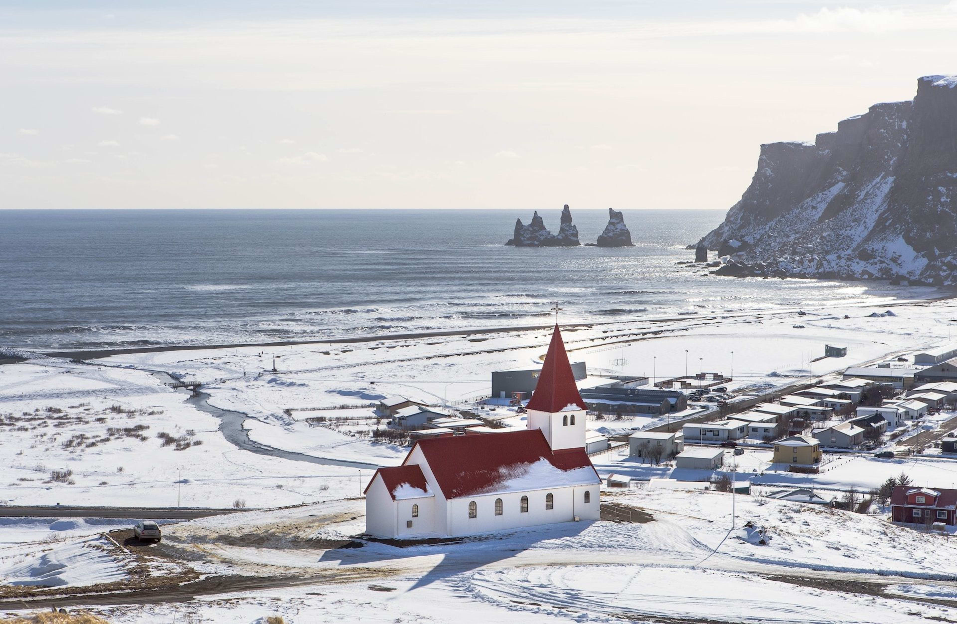 winter vik village and its red church 
