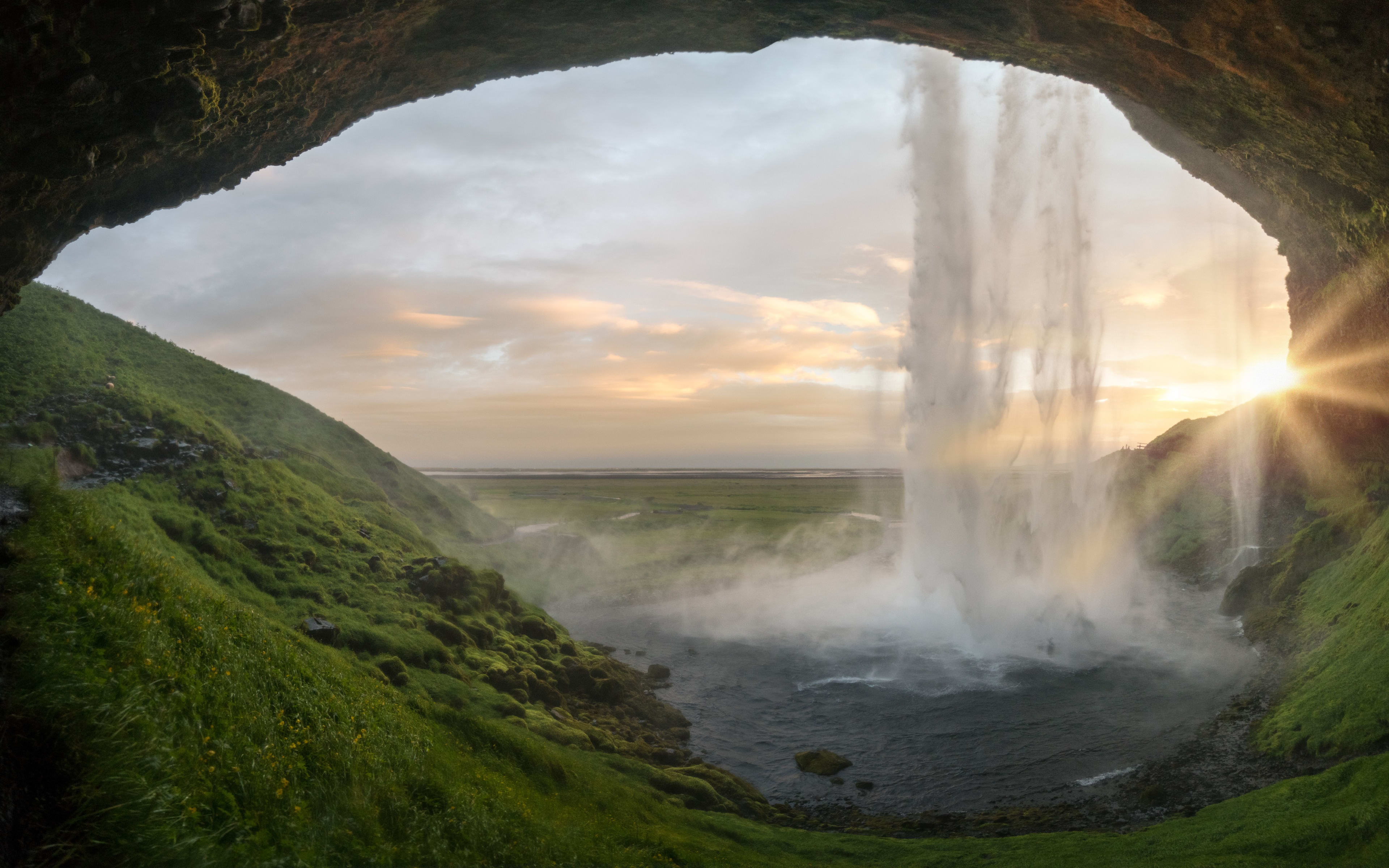 view of seljalandsfoss and sunlight from behind