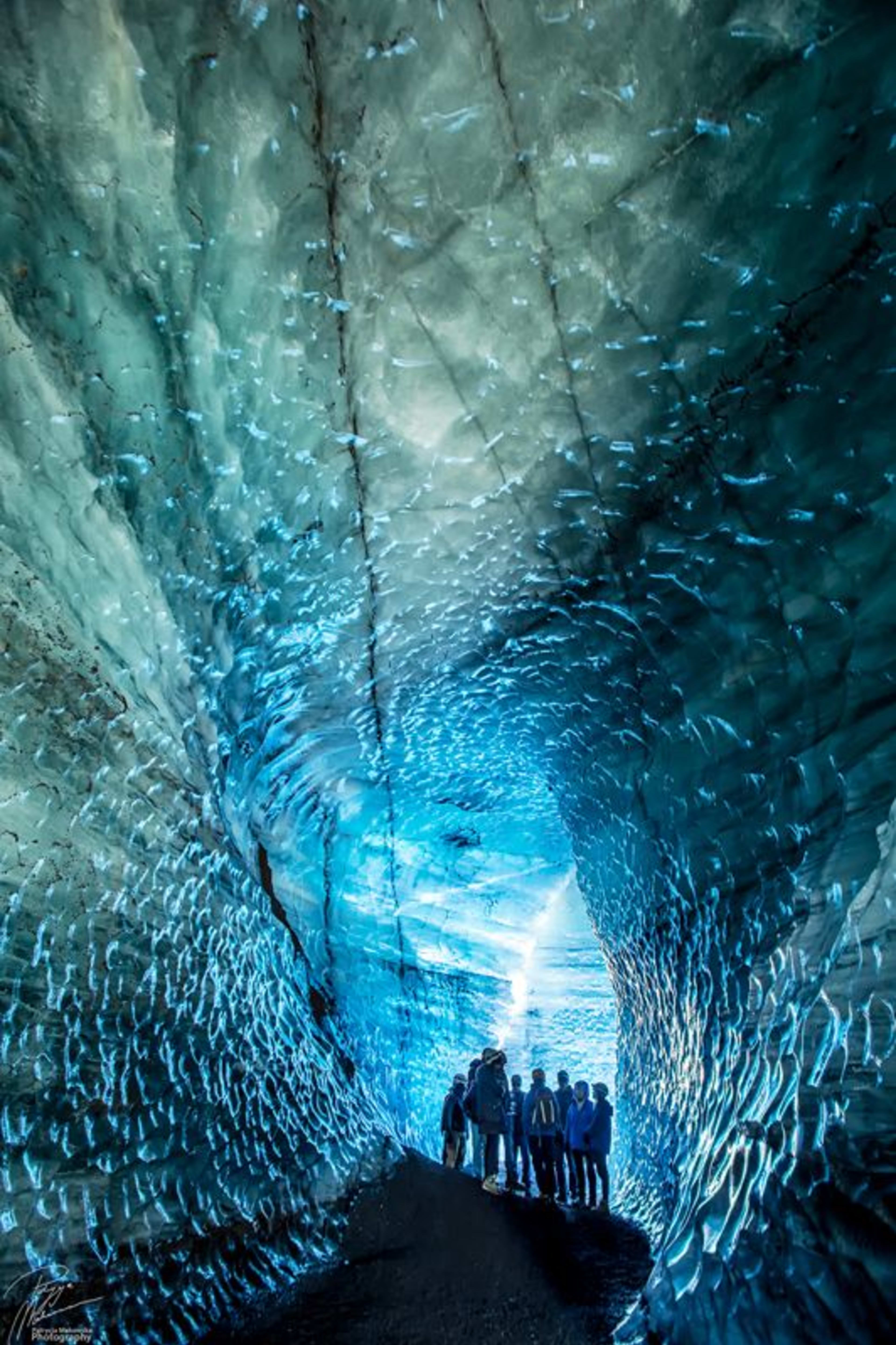 small group visiting katla ice cave
