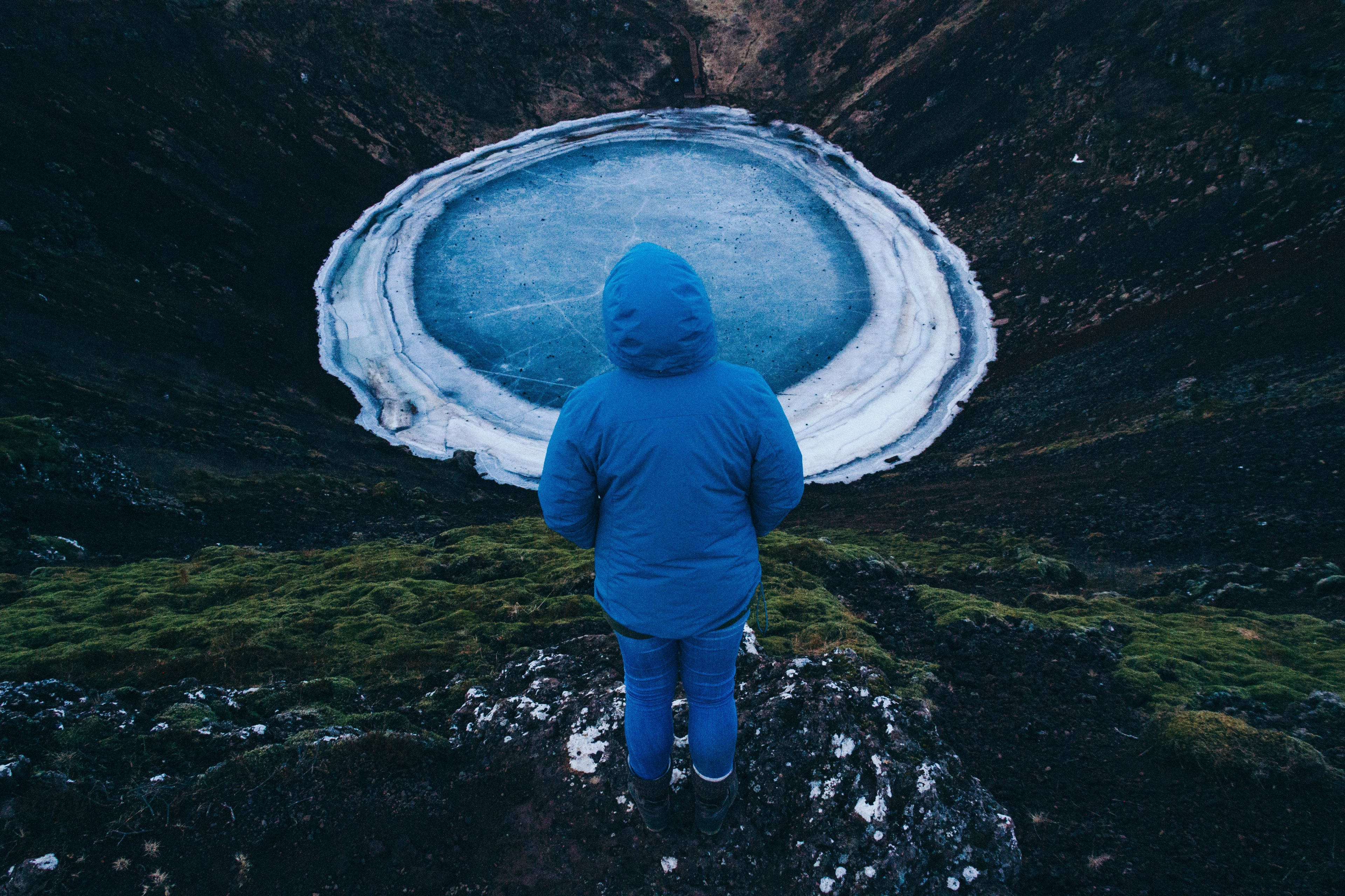 people look down at kerid crater lake