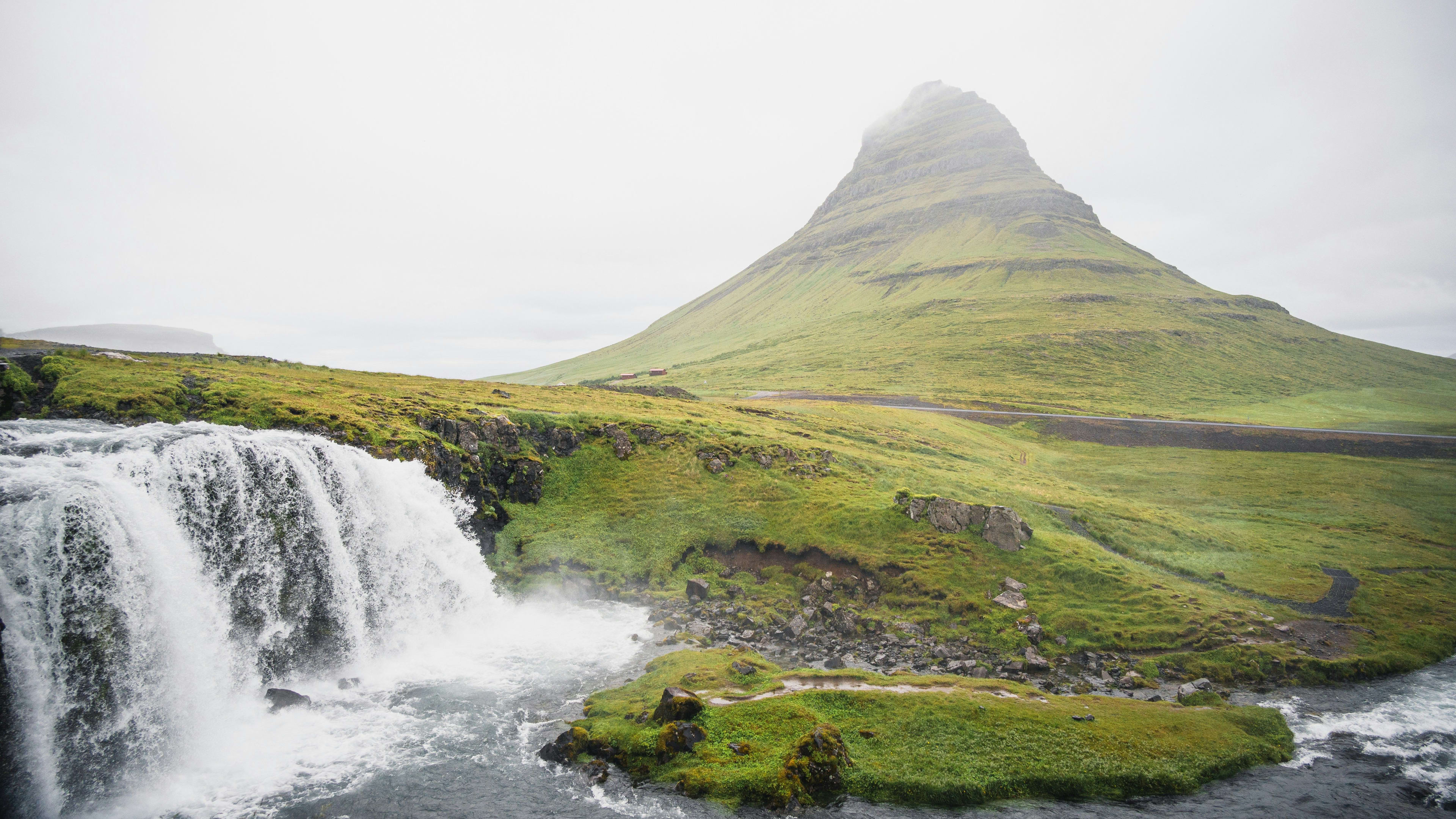 kirkjufell and waterfall in summer foggy days
