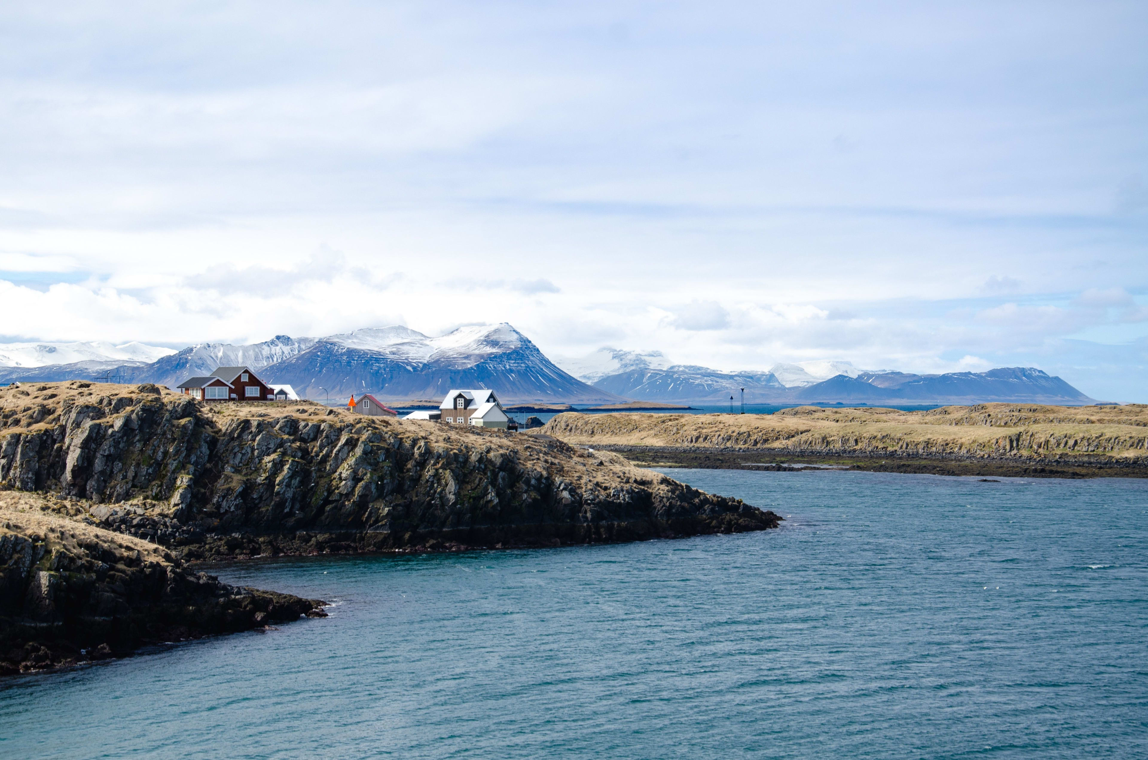 stykkisholmur coast with glacier from distance