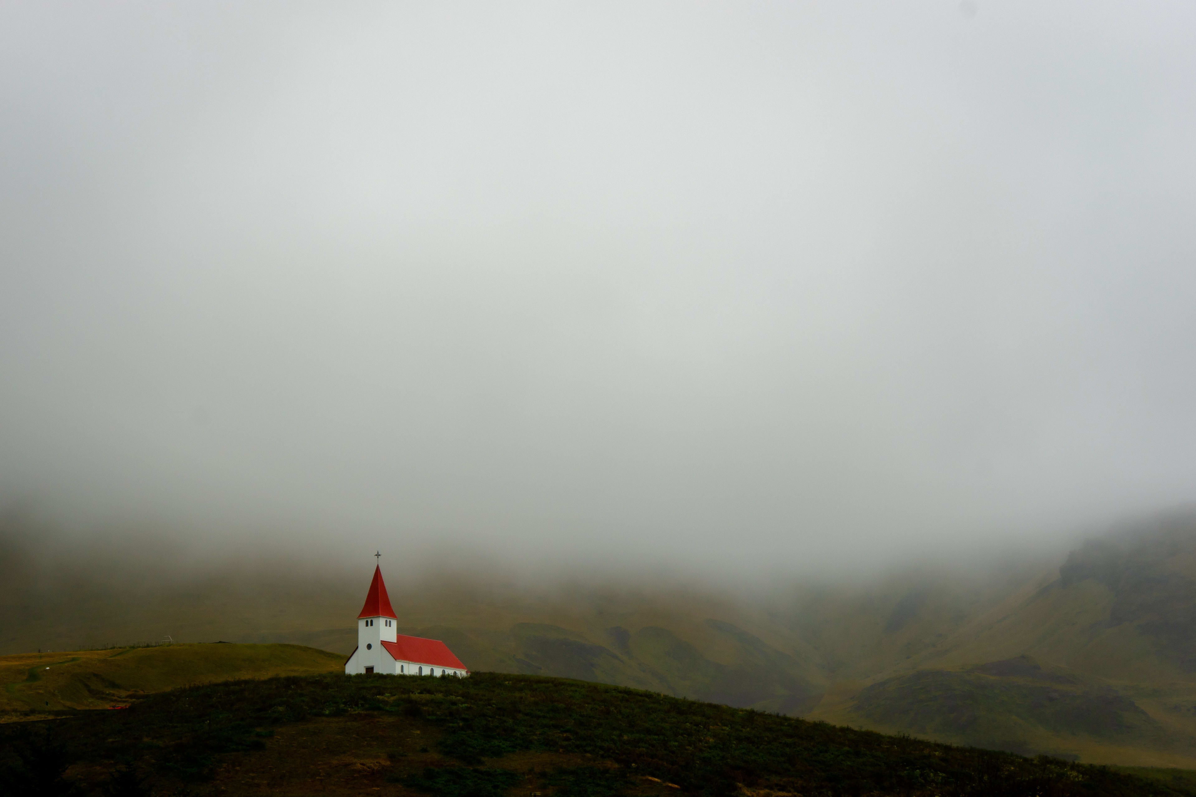 vik red church in foggy day